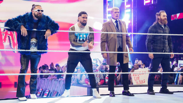 Seth Rollins, Jey Uso, Cody Rhodes and Sami Zayn on the ring apron during Raw