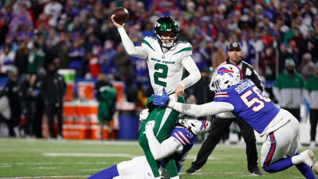 Jets' QB Zach Wilson under heavy pressure from the Bills' defense