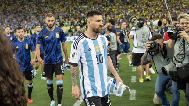 Argentina star Lionel Messi walks off the field after a match vs. Brazil.