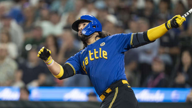 Seattle Mariners third baseman Eugenio Suarez homers off Bobby Miller at T-Mobile Park.