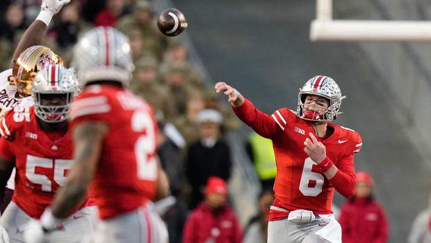 Nov 18, 2023; Columbus, Ohio, USA; Ohio State Buckeyes quarterback Kyle McCord (6) throws a pass during the first half of the NCAA football game against the Minnesota Golden Gophers at Ohio Stadium.