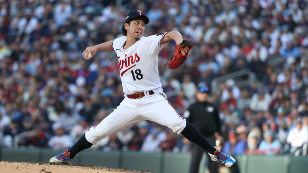 Oct 10, 2023; Minneapolis, Minnesota, USA; Minnesota Twins relief pitcher Kenta Maeda (18) pitches in the sixth inning against the Houston Astros during game three of the ALDS for the 2023 MLB playoffs at Target Field.