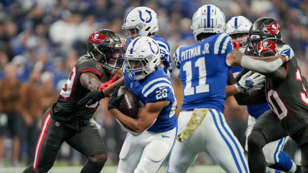 Indianapolis Colts running back Jonathan Taylor (28) rushes the ball Sunday, Nov. 26, 2023, during a game against the Tampa Bay Buccaneers at Lucas Oil Stadium in Indianapolis.