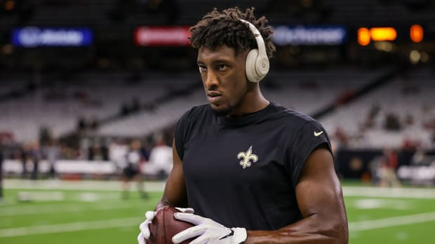 Saints wide receiver Michael Thomas (13) warms up before the game against the Buccaneers at Caesars Superdome.