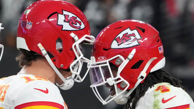 Nov 26, 2023; Paradise, Nevada, USA; Kansas City Chiefs wide receiver Rashee Rice (4) celebrates with quarterback Patrick Mahomes (15) after a touchdown against the Las Vegas Raiders in the second half at Allegiant Stadium. Mandatory Credit: Kirby Lee-USA TODAY Sports  