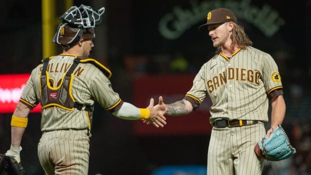 Sep 26, 2023; San Francisco, California, USA; San Diego Padres catcher Brett Sullivan (29) and relief pitcher Josh Hader (71) shake hands after defeating the San Francisco Giants at Oracle Park. Mandatory Credit: Ed Szczepanski-USA TODAY Sports  