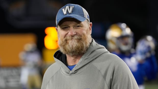 Nov 19, 2023; Hamilton, Ontario, CAN; Winnipeg Blue Bombers head coach Mike O'Shea during warm up before a game against the Montreal Alouettes at Tim Hortons Field. Mandatory Credit: John E. Sokolowski-USA TODAY Sports