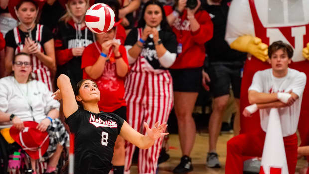 Oct 21, 2023; Lincoln, NE, USA; Nebraska Cornhuskers libero Lexi Rodriguez (8) serves against the Wisconsin Badgers during the fifth set at the Bob Devaney Sports Center.