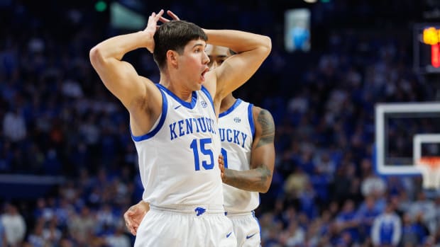 Nov 28, 2023; Lexington, Kentucky, USA; Kentucky Wildcats guard Reed Sheppard (15) reacts after being called for a foul during the first half against the Miami (Fl) Hurricanes at Rupp Arena at Central Bank Center. Mandatory Credit: Jordan Prather-USA TODAY Sports