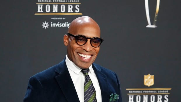 Feb 9, 2023; Phoenix, Arizona, US; Tiki Barber poses for a photo on the red carpet before the NFL Honors award show at Symphony Hall.