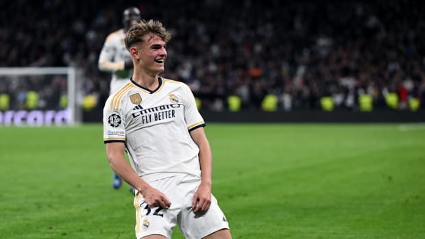 Nico Paz pictured celebrating after scoring the first goal of his Real Madrid career during a 4-2 win over Napoli in the UEFA Champions League in November 2023