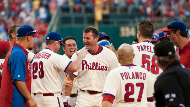 Jun 23, 2012; Philadelphia, PA, USA; Philadelphia Phillies pinch hitter Jim Thome (25) celebrates hitting a game winning walk off home run in the ninth inning against the Tampa Bay Rays at Citizens Bank Park. The Phillies defeated the Rays 7-6. Mandatory Credit: Howard Smith-USA TODAY Sports