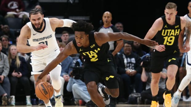 Nov 29, 2023; Memphis, Tennessee, USA; Utah Jazz guard Collin Sexton (2) picks up a loose ball for the steal during the second half against the Memphis Grizzlies at FedExForum.