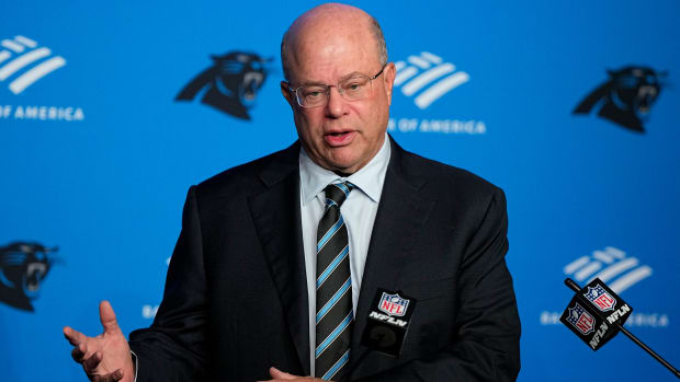 Panthers owner David Tepper speaks to reporters during a press conference.