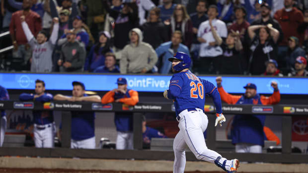 Sep 27, 2023; New York, NY, USA; New York Mets first baseman Pete Alonso (20) doubles during the eighth inning against the Miami Marlins at Citi Field.