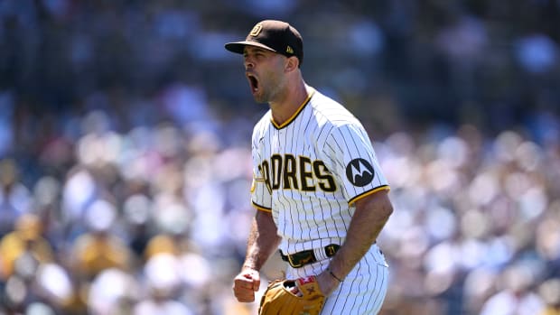Jul 26, 2023; San Diego, California, USA; San Diego Padres relief pitcher Nick Martinez (21) reacts after the last out of the top of the eighth inning was recorded against the Pittsburgh Pirates at Petco Park.
