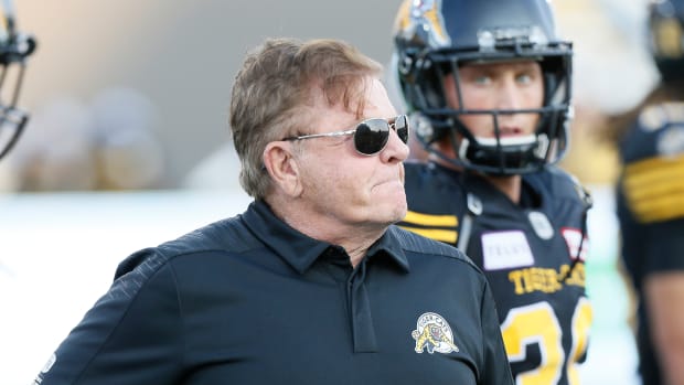 Aug 23, 2018; Hamilton, Ontario, CAN; Hamilton Tiger-Cats defensive coordinator Jerry Glanville during warm up against the Edmonton Eskimos during a Canadian Football League game at Tim Hortons Field. Mandatory Credit: John E. Sokolowski-USA TODAY Sports