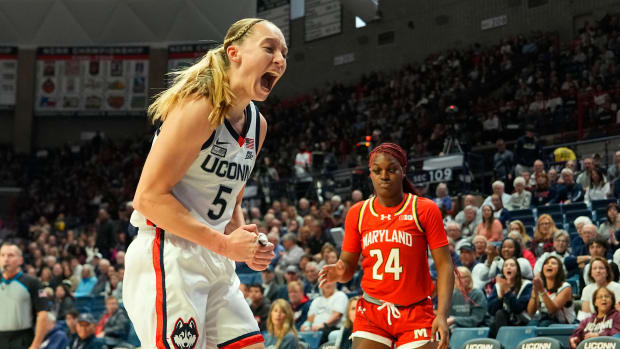 Nov 16, 2023; Storrs, Connecticut, USA; Connecticut Huskies guard Paige Bueckers (5) reacts to making a defensive play against the Maryland Terrapins during the first half at Harry A. Gampel Pavilion.