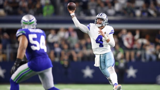 Dallas Cowboys quarterback Dak Prescott (4) throws a pass during the second half against the Seattle Seahawks at AT&T Stadium.