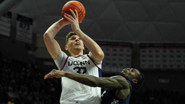 Nov 27, 2023; Storrs, Connecticut, USA; UConn Huskies center Donovan Clingan (32) shoots against New Hampshire Wildcats forward Clarence Daniels (21) in the second half at Harry A. Gampel Pavilion.