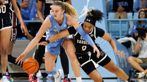 South Carolina's Te-Hina Paopao (0) attempts to steal the ball from North Carolina's Alyssa Ustby during the second half of a game.