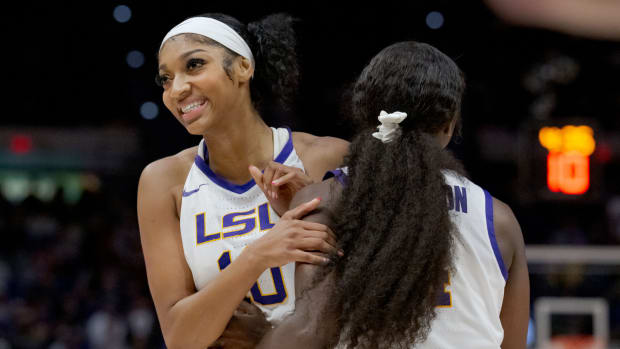 LSU forward Angel Reese and guard  Flau’jae Johnson celebrate during the Lady Tigers’ win over Virginia Tech on Nov. 20, 2023.
