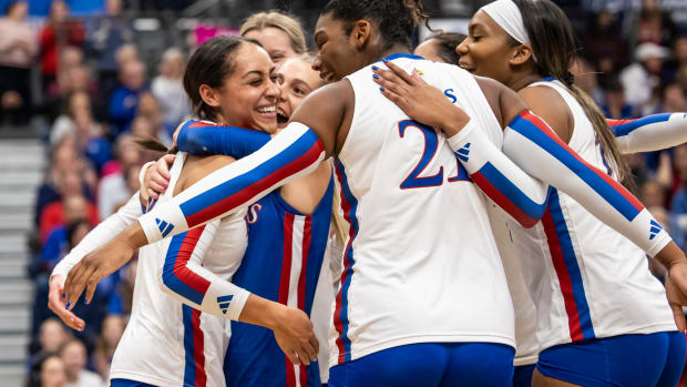 The Kansas Jayhawks celebrate a point during the NCAA Volleyball tournament.