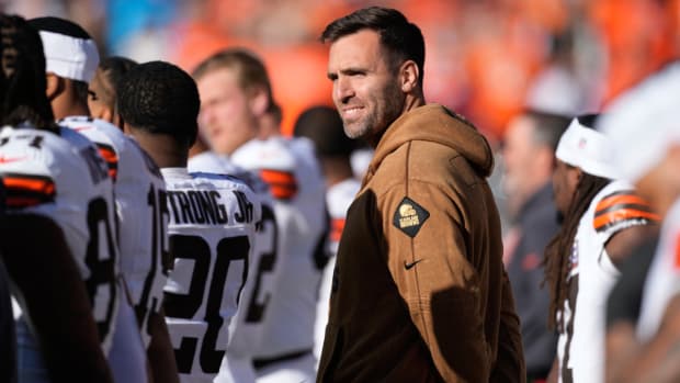 Cleveland Browns quarterback Joe Flacco stands with teammates during the playing of the national anthem before the Browns face the Denver Broncos in an NFL football game Sunday, Nov. 26, 2023, in Denver. The Browns are once again in quarterback limbo. The only difference this time is that they have a more suitable backup plan. With rookie starter Dorian Thompson-Robinson in concussion protocol after taking a brutal hit in Sunday's loss at Denver, the Browns may have to make yet another switch and put their season — and playoff hopes — in the hands of Flacco. (AP Photo/David Zalubowski)   