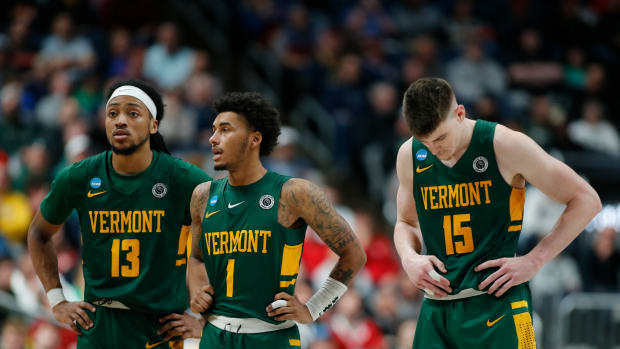 Vermont guards Dylan Penn, Aaron Deloney and Finn Sullivan during the Catamounts' 78-61 loss to No. 6 Marquette in the first round of the NCAA tournament on March 17, 2023.
