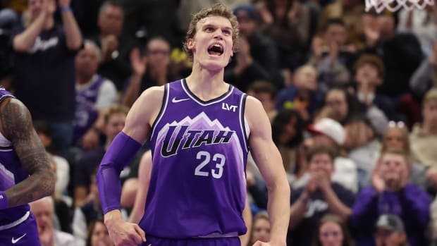 Utah Jazz forward Lauri Markkanen (23) reacts to a play against the Phoenix Suns in the second quarter at Delta Center.