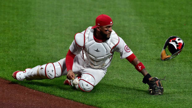 May 5, 2021; St. Louis, Missouri, USA; St. Louis Cardinals catcher Ali Sanchez (41) chases after a wild pitch by starting pitcher Johan Oviedo (not pictured) as New York Mets left fielder Dominic Smith (not pictured) runs home to score during the second inning in game two of a doubleheader at Busch Stadium.