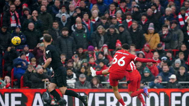 Trent Alexander-Arnold pictured taking a free-kick to score for Liverpool against Fulham in December 2023