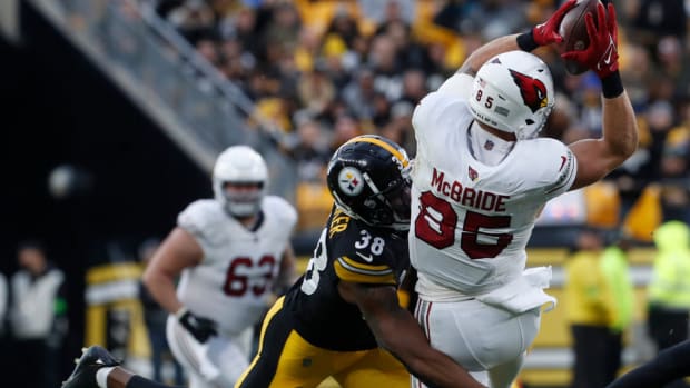 Arizona Cardinals tight end Trey McBride (85) makes a acatch against Pittsburgh Steelers linebacker Mykal Walker (38) during the second quarter at Acrisure Stadium.