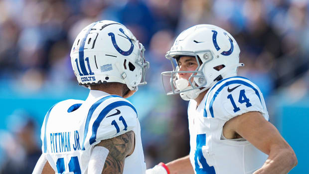 Indianapolis Colts wide receiver Michael Pittman Jr. (11) and wide receiver Alec Pierce (14) celebrate a touchdown by Pierce on Sunday, Dec. 3, 2023, during a game against the Tennessee Titans at Nissan Stadium in Nashville, Tenn.  