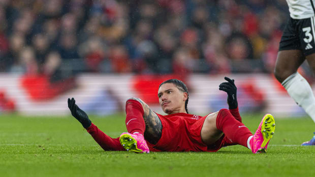 Darwin Nunez pictured lying on the floor during Liverpool's EPL game against Fulham in December 2023