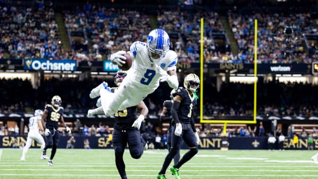 Dec 3, 2023; New Orleans, Louisiana, USA; Detroit Lions wide receiver Jameson Williams (9) leaps in for a touchdown against the New Orleans Saints during the second half at the Caesars Superdome. Mandatory Credit: Stephen Lew-USA TODAY Sports  