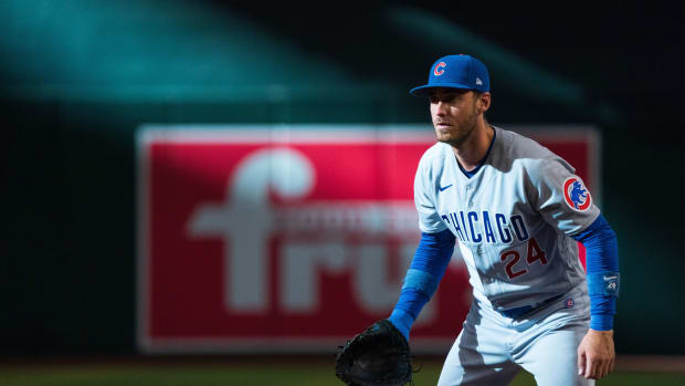 Sep 17, 2023; Phoenix, Arizona, USA; Chicago Cubs outfielder Cody Bellinger (24) reacts at first base in the second inning against the Arizona Diamondbacks at Chase Field.