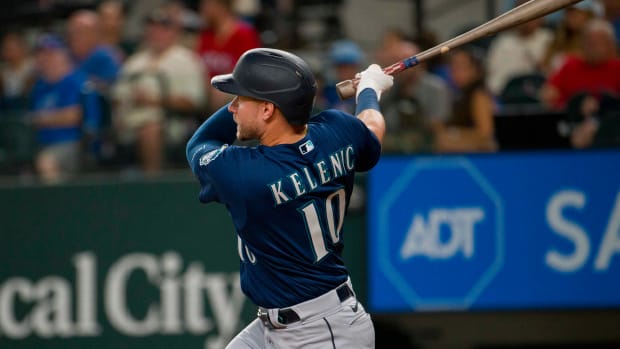 Sep 22, 2023; Arlington, Texas, USA; Seattle Mariners left fielder Jarred Kelenic (10) hits a double against the Texas Rangers during the fifth inning at Globe Life Field.