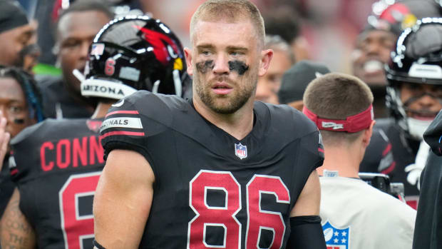 FILE - Arizona Cardinals tight end Zach Ertz pauses on the field prior to an NFL football game against the Cincinnati Bengals Sunday, Oct. 8, 2023, in Glendale, Ariz. The Arizona Cardinals released veteran tight end Zach Ertz on Thursday, Nov. 30, clearing the way for the rapidly-improving Trey McBride to assume the starting role. The 33-year-old Ertz is a three-time Pro Bowl selection who has spent the past five games on injured reserve with a quadriceps injury. (AP Photo/Ross D. Franklin, File)   