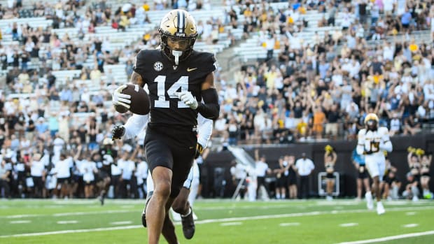 Sep 30, 2023; Nashville, Tennessee, USA; Vanderbilt Commodores wide receiver Will Sheppard (14) scores a touchdown against the Missouri Tigers during the second half at FirstBank Stadium.