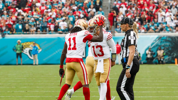 Nov 12, 2023; Jacksonville, Florida, USA; San Francisco 49ers wide receiver Brandon Aiyuk (11) and quarterback Brock Purdy (13) celebrate a touchdown against the Jacksonville Jaguars during the first quarter at EverBank Stadium. Mandatory Credit: Morgan Tencza-USA TODAY Sports  