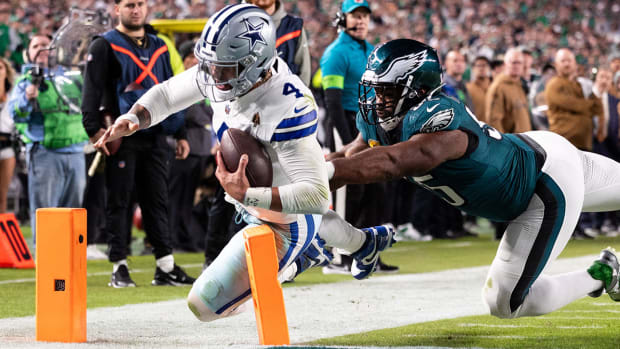 Dak Prescott is pushed out of bounds at the pylon trying to run for a touchdown against the Eagles.