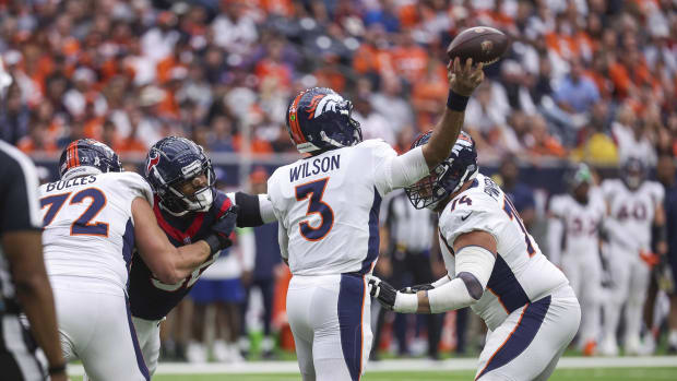 Denver Broncos quarterback Russell Wilson (3) attempts a pass during the first quarter against the Houston Texans at NRG Stadium.