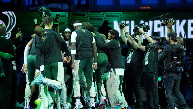 The Milwaukee Bucks huddle before paying against the Indiana Pacers 