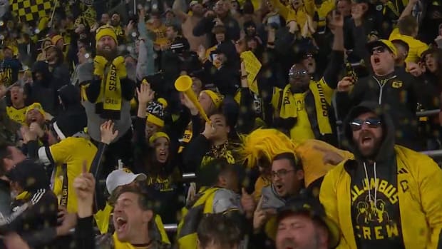 Columbus Crew fans pictured celebrating during their team's victory over LAFC in the 2023 MLS Cup final