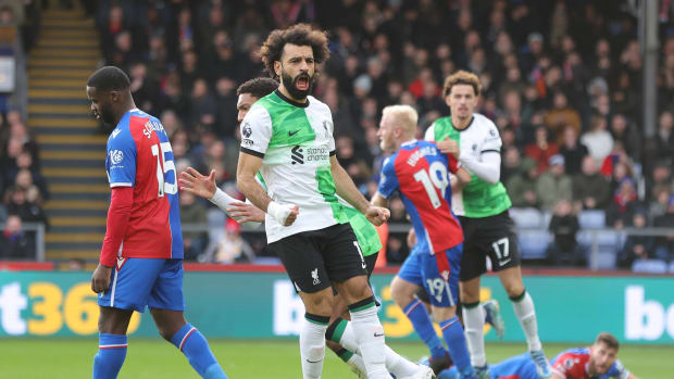 Mohamed Salah pictured (center) celebrating after scoring the 200th goal of his Liverpool career in a 2-1 win at Crystal Palace in December 2023