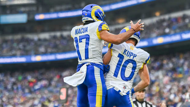 Los Angeles Rams wide receiver Cooper Kupp (10) celebrates with wide receiver Puka Nacua (17) after scoring a second quarter touchdown during the at M&T Bank Stadium. 