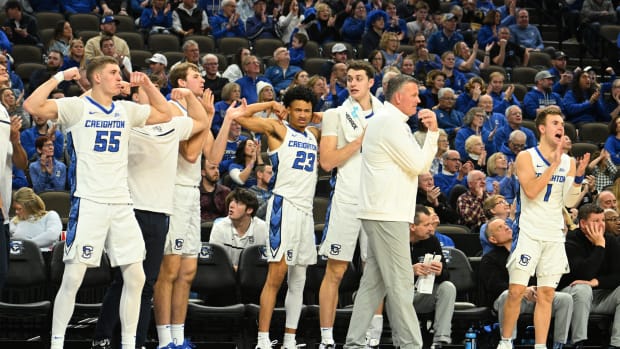Dec 9, 2023; Omaha, Nebraska, USA; Creighton Bluejays guard Baylor Scheierman (55) and guard Trey Alexander (23) and the rest of the Bluejays starters celebrate in the second half against the Central Michigan Chippewas at CHI Health Center Omaha.