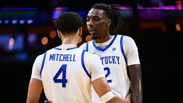 Dec 9, 2023; Philadelphia, Pennsylvania, USA; Kentucky Wildcats forward Aaron Bradshaw (2) talks with forward Tre Mitchell (4) in the first half against the Penn Quakers at Wells Fargo Center. Mandatory Credit: Kyle Ross-USA TODAY Sports