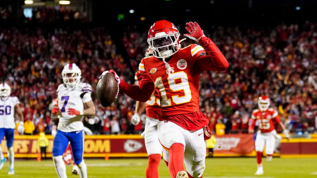 Dec 10, 2023; Kansas City, Missouri, USA; Kansas City Chiefs wide receiver Kadarius Toney (19) scores a touchdown during the second half against the Buffalo Bills at GEHA Field at Arrowhead Stadium. The play would be called back due to an offensive penalty. Mandatory Credit: Jay Biggerstaff-USA TODAY Sports  
